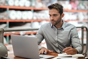 man-working-on-computer